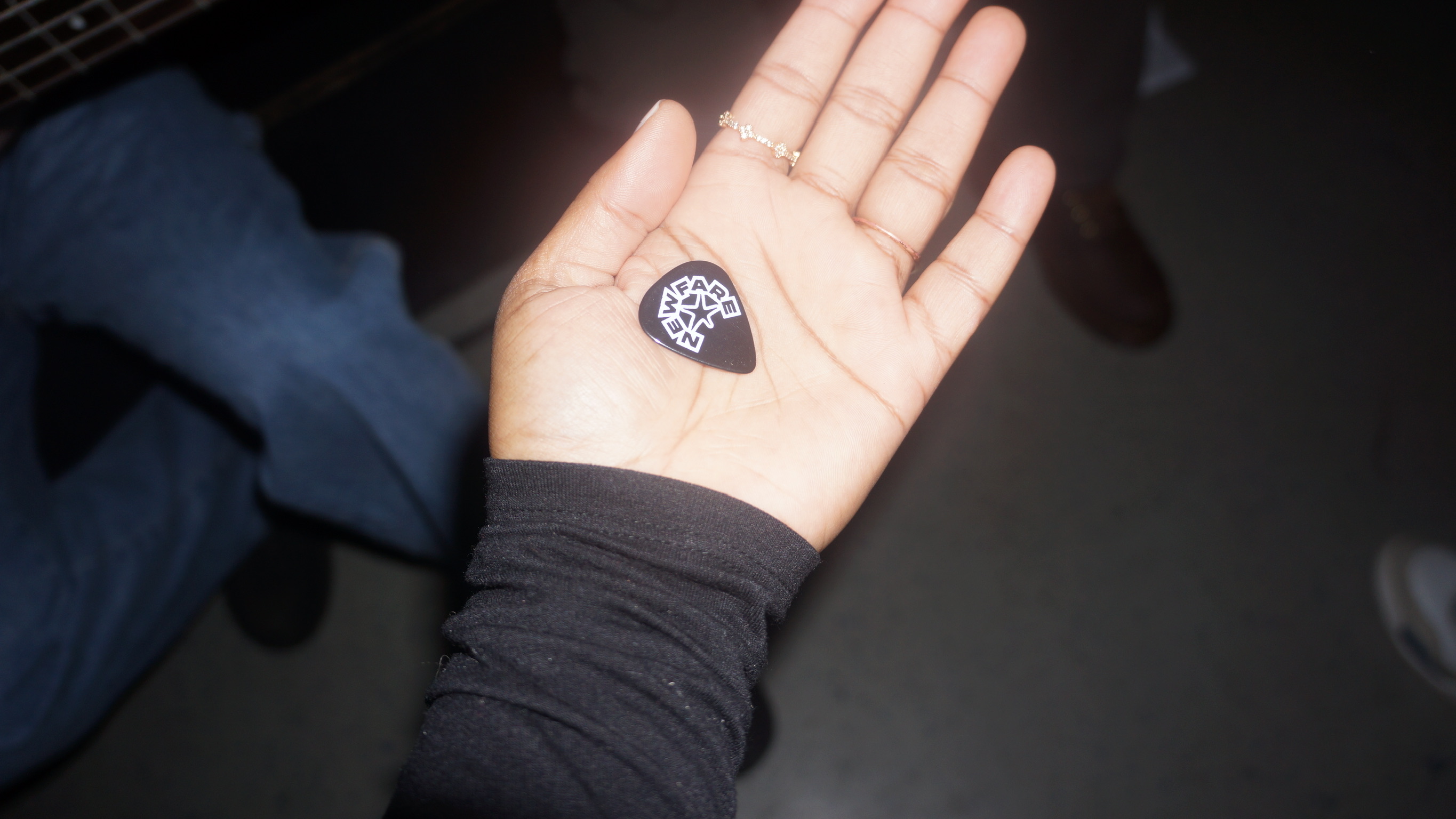 Close-up of guitarist playing live