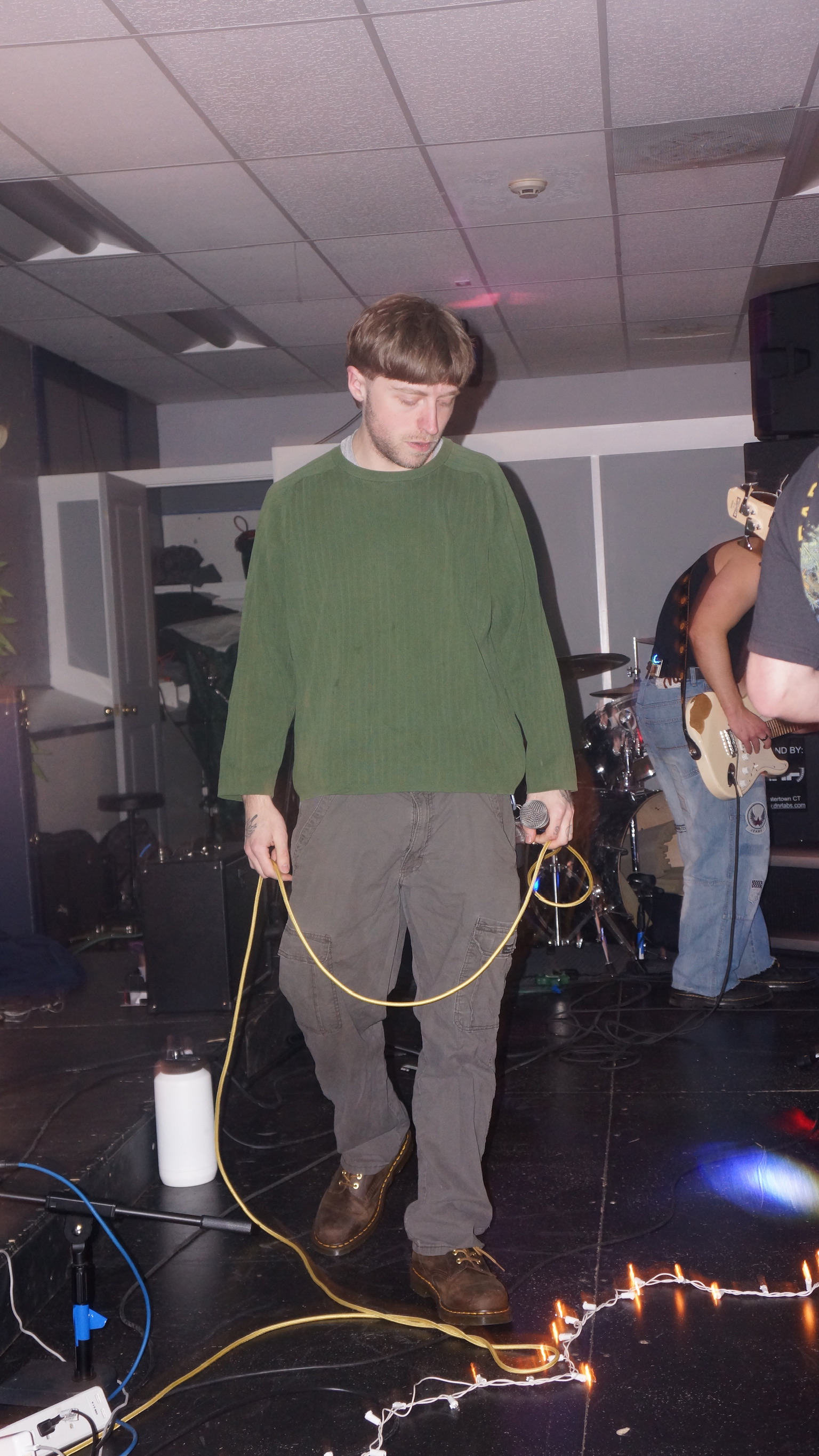 Harrison mid-set at live show