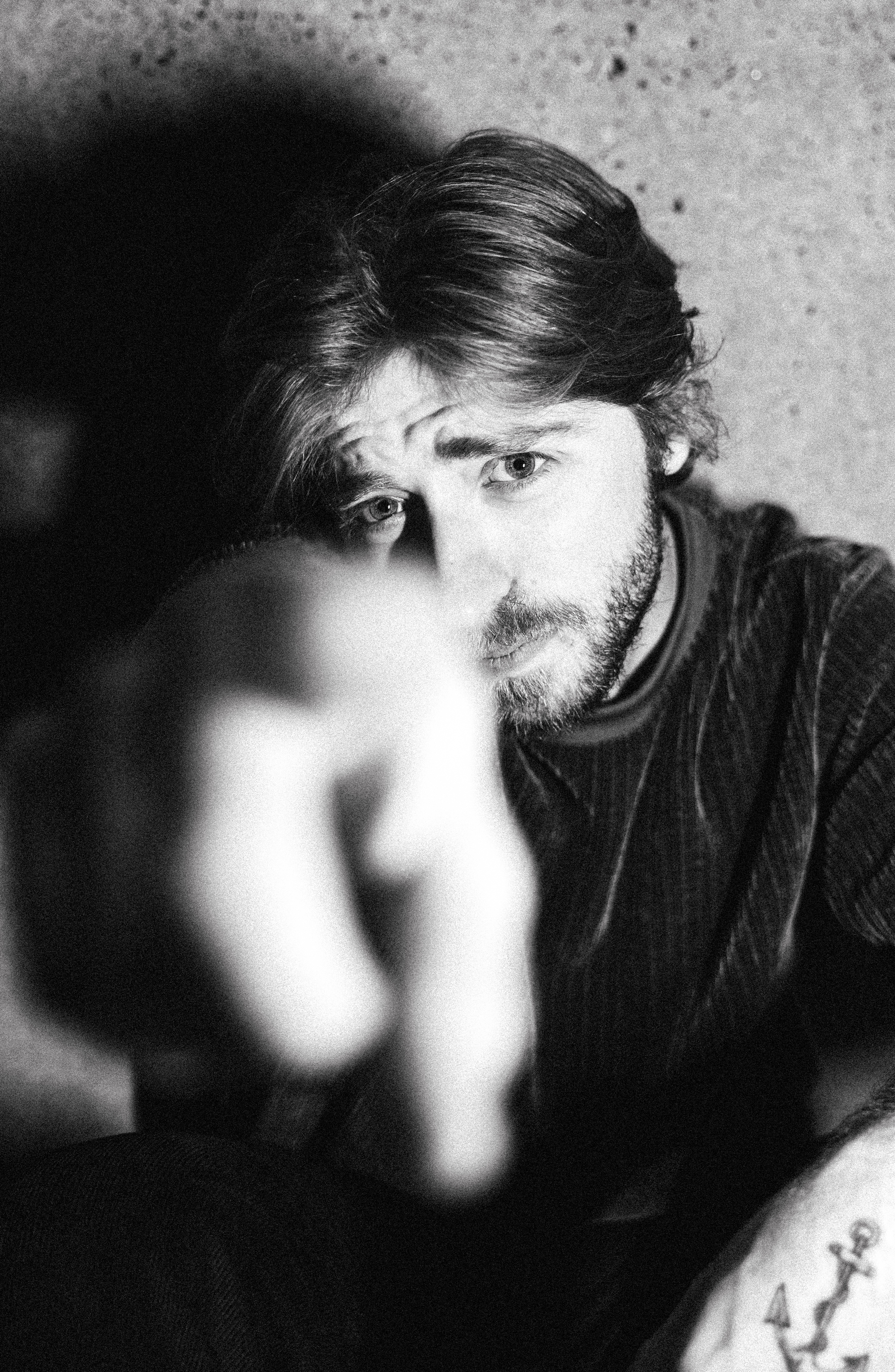 Harrison's close up, pointing at the camera.