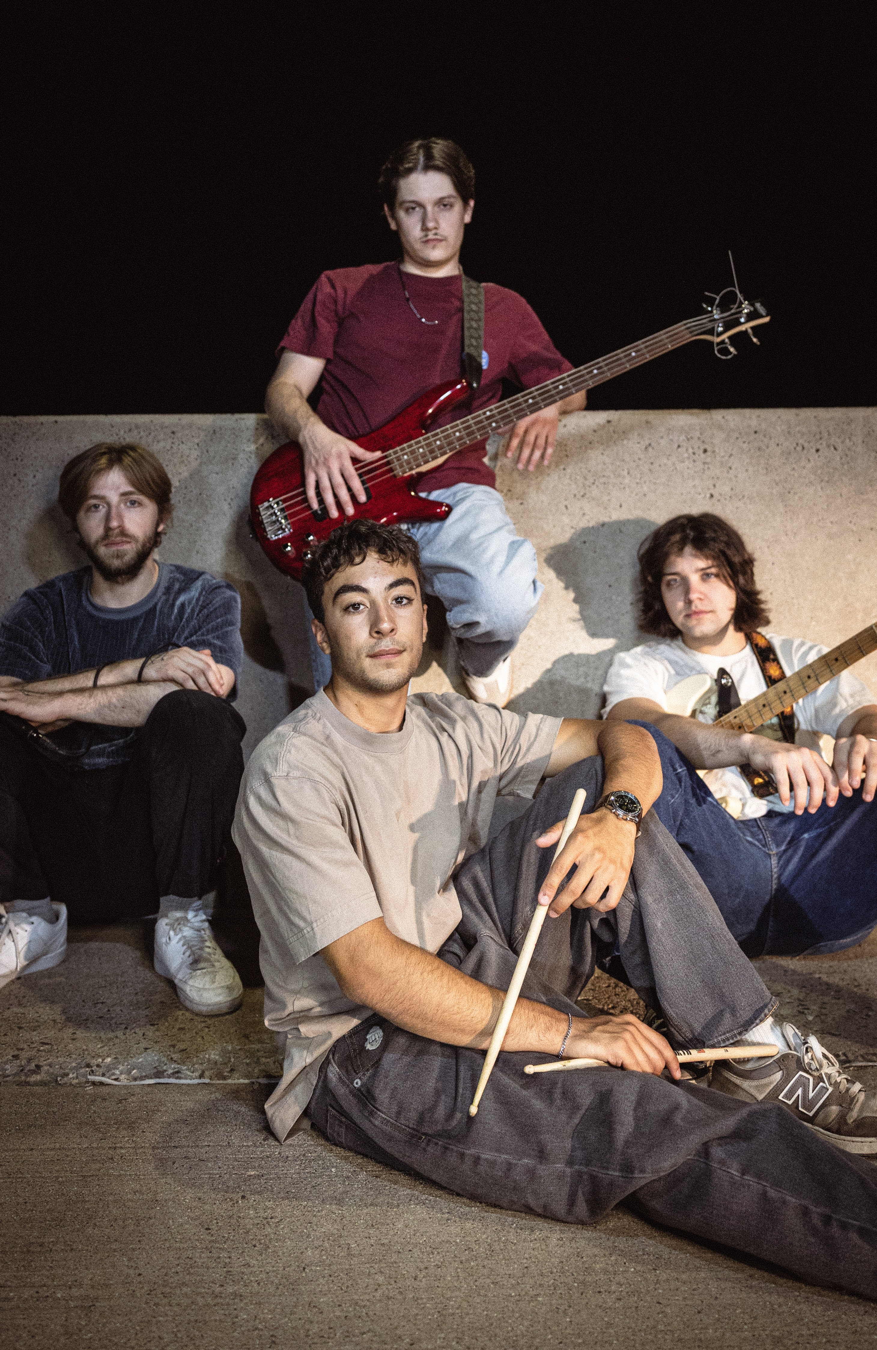 NewFare promotional group photo of the band.